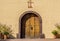 Round wooden door at a California mission