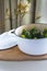 Round zucchinis, stuffed, front view, green vegan spring dish