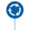 Roundabout crossroad road sign isolated, blue, white arrows left hand, roadside traffic signage vertical closeup