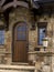 Rounded Wooden Doorway in Welcome Guardhouse