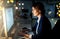 Rounding off a couple of deadlines. Shot of a young businesswoman working late on a computer in an office.