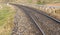 Rounding of railway abandoned rusty,. Empty turning single track of railways.