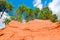 Roussillon ochre deposit: Blue sky, beautiful red hills and green pines