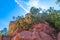Roussillon, red rocks colorful ochre canyon in Provence