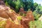 Roussillon, red rocks of colorful ochre canyon in Provence