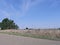 Route 66 highway with the Glenrio ghost town covered by shrubs. Glenrio is one of America`s ghost towns at the border of New