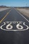 Route 66 highway shield painted on road in California