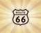 Route 66 sign. American road icon. Travel USA retro background.