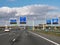 Route information on overhead gantry, orbital motorway A2 traffic junction Oudenrijn, Utrecht, Netherlands