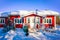 Rovaniemi, Finland - March 5, 2017: Cozy House in Winter Snow Forest at Finnish Saami Farm in Rovaniemi, Finland, Lapland at