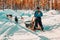 Rovaniemi, Finland - March 5, 2017: Woman on Husky Dogs Sled in Rovaniemi in Finland of Lapland at Christmas. Dogsled as a canine