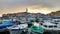 Rovinj, Croatia; 7/18/2019: Port of Rovinj, with many boats at the foreground and the view of the croatian houses and the bell