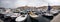 Rovinj, Croatia - August 31, 2007: Motorboats, boats and yachts on water in port of Rovinj. Medieval vintage houses of old town on