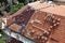 ROVINJ, CROATIA - October 07, 2019: Roofers on the roof of the building are laying new tiles. Rovinj old town, Istria, Europe.