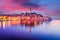 Rovinj, Croatia. Twilight with old town harbor water reflection. Istria Peninsula