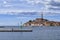 Rovinj town with multicolored buildings and yachts moored along embankment, Croatia.