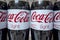 A row of 1.5 liter Coca Cola Light PET bottles