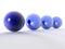 Row of 3d blue spheres