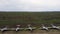 A row of abandoned military aircraft. Retired military base for storing aircraft