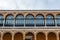 Row of arched windows in Patio de la Monteria