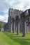 Row of arches at ancient priory in Brecon Beacons South Wales, UK