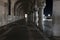 Row of arches underneath the Doge`s Palace in Piazza San Marco in Venice. Archway medieval columns in Venice