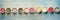 Row of assorted flavors and colors of gourmet Italian ice cream