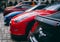 Row of beautiful supercars parked in the city centre.