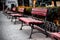 A row of benches in the Odessa park. Odessa steam on the seaside boulevard.