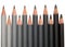 Row of black graphite pencils with different hardness