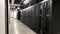 Row of Black Servers in a Data Center Facility