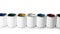 Row of blank paint cans on white background