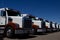 Row of Brand New Medium-Duty Commercial Vehicles