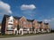 Row of Brick Condos With Bay Windows