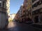 Row of buildings in a narrow urban alleyway in Innsbruck, Austria