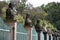 Row of busts on pillars in ancient fence