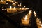 Row of candles in a church a symbol of religion and a memory of beloved ones