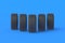 Row of car tyres on blue background. Automotive parts. Traffic safety