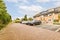 a row of cars parked in front of a house