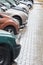 Row of cars on parking lot on rainy day