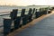 Row of Chairs along the East River in the Seaport area of New York City during Sunset