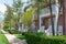 Row of charming brick townhomes in suburban neighborhood