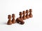 Row of chess pawns with one pawn fell in line. Weak link in the team or employee burnout and exhaustion