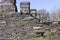 Row of chimneys and roof remains of the Anglesey Barracks at Dinorwic Quarry, Llanberis, North Wales