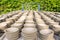 Row of clay hand made bowls dried on sun