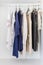 Row of cloth hanging on coat hanger