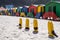 Row of colorful bathing houses at Muizenberg beach