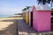 Row of colorful beach huts in the sand beach in atlantic west french coast
