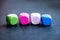 Row of colorful cube beads