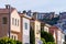 Row of colorful houses in the Marina District residential neighborhood; Pacific Heights residential district visible in the
